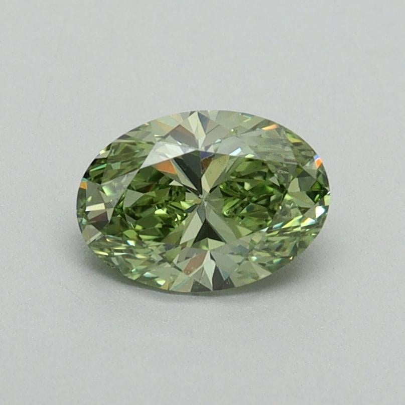 0.67 Ct. Fancy Vivid Green Oval Lab Grown Diamond