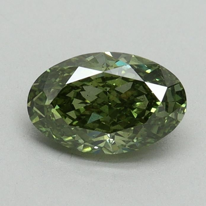 0.74 Ct. Fancy Vivid Green Oval Lab Grown Diamond