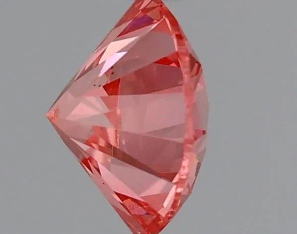 0.58 Ct. Fancy Vivid Pink Round Lab Grown Diamond