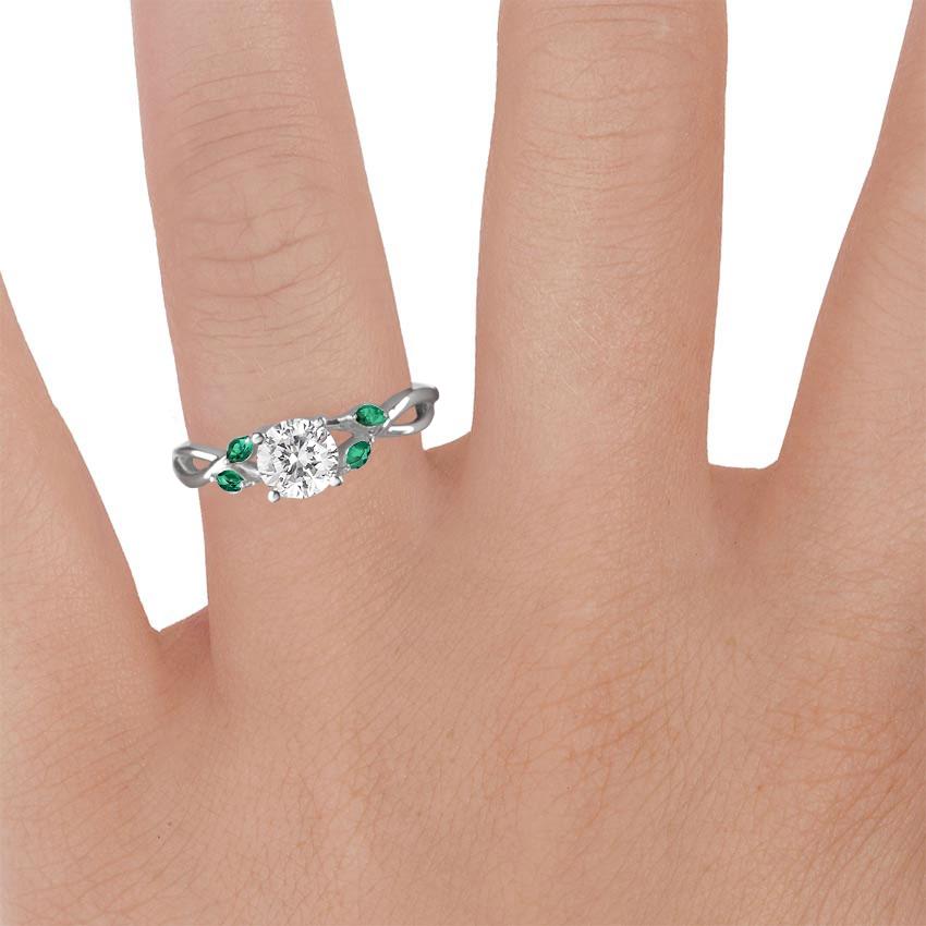 18K White Gold Willow Ring With Lab Emerald Accents, large zoomed in top view on a hand
