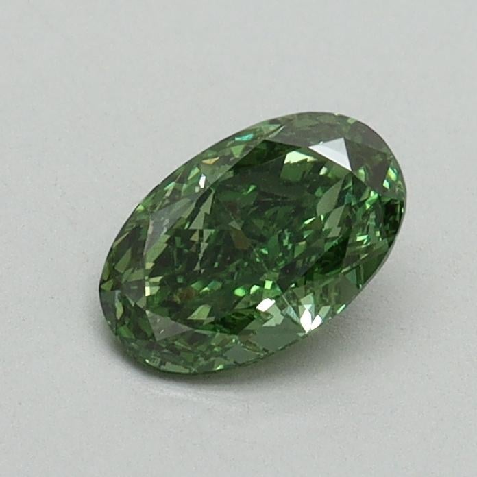 0.53 Ct. Fancy Vivid Green Oval Lab Grown Diamond