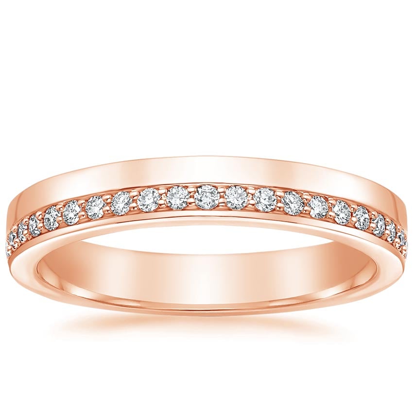 Rose gold diamond engagement ring with surprise diamond details