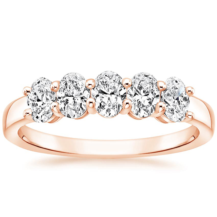 Rose gold diamond engagement ring with surprise diamond details