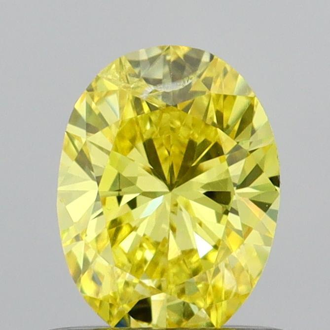 0.56 Ct. Fancy Vivid Yellow Oval Lab Grown Diamond