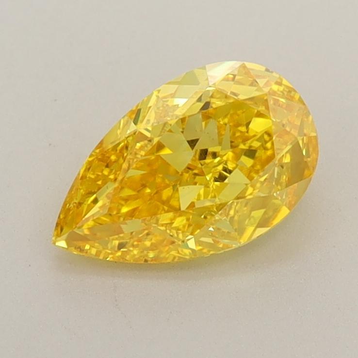 0.99 Ct. Fancy Vivid Yellow Pear Lab Grown Diamond