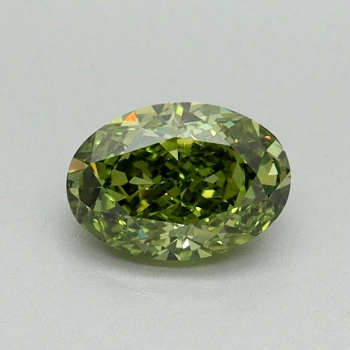 0.51 Ct. Fancy Vivid Green Oval Lab Grown Diamond