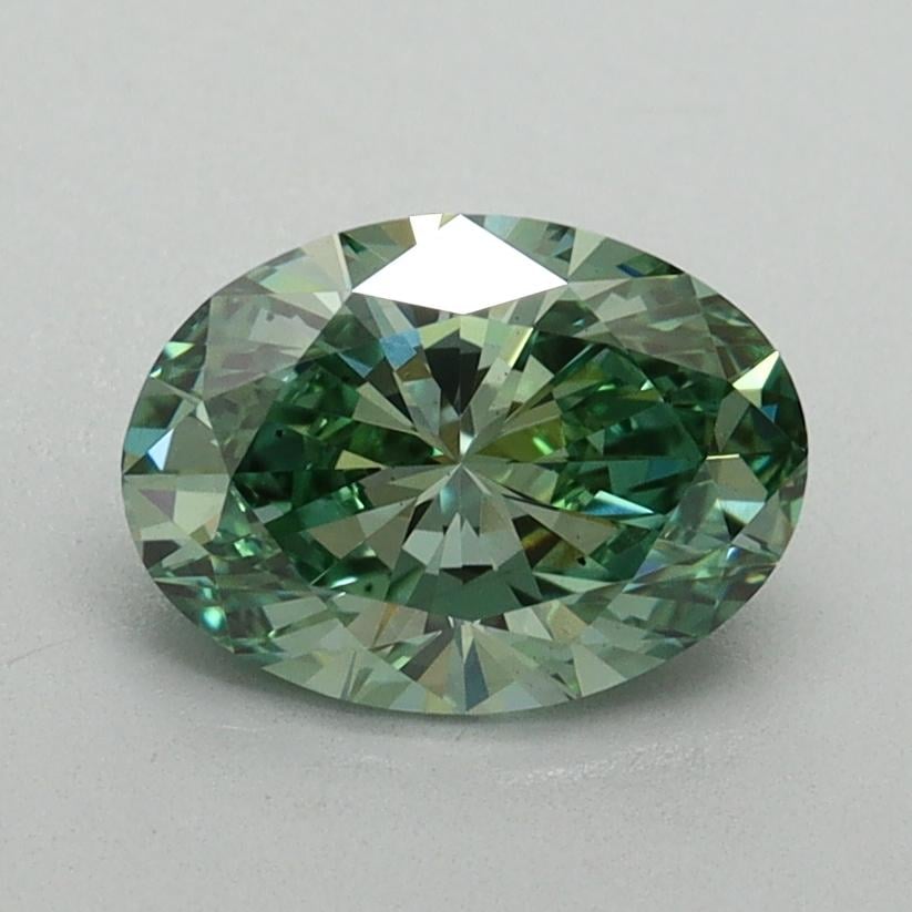 1.15 Ct. Fancy Vivid Pacific Green Oval Lab Grown Diamond