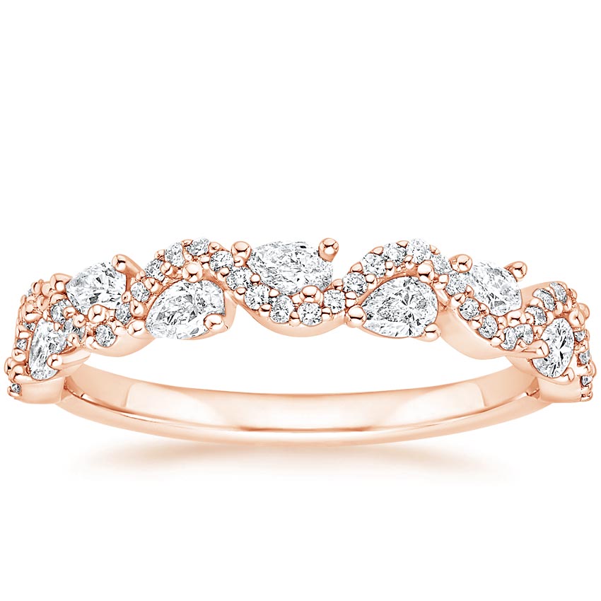 Rose gold diamond engagement ring with surprise diamond details