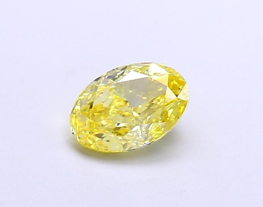 1.01 Ct. Fancy Vivid  Yellow Oval Lab Grown Diamond