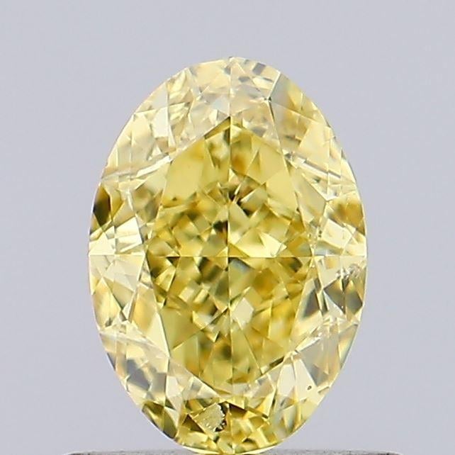 0.72 Ct. Fancy Vivid  Yellow Oval Lab Grown Diamond