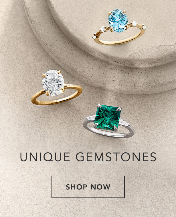 Three different colored gemstone rings