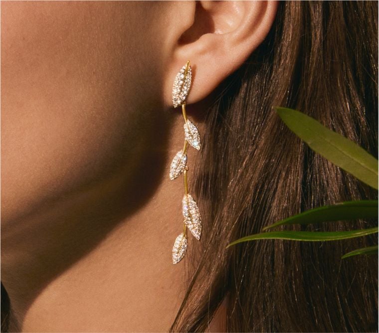 Model wearing diamond pavé drop earrings from the Jane Goodall collection.