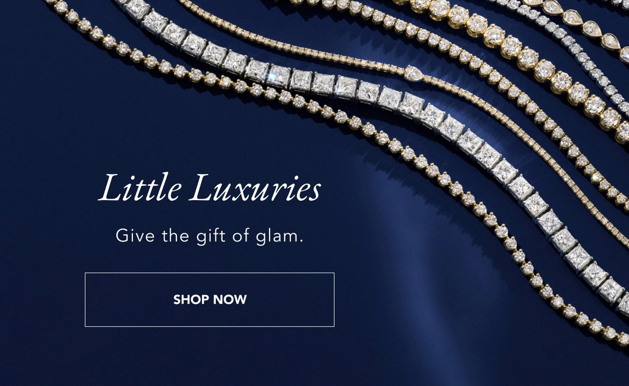 Assortment of diamond tennis bracelets and necklaces.