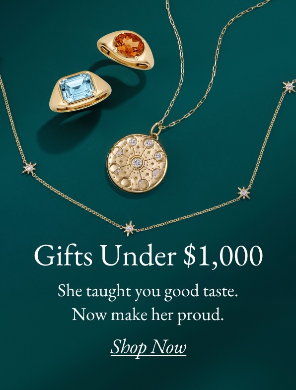 Assortment of diamond necklaces and gemstone rings under $1,000.