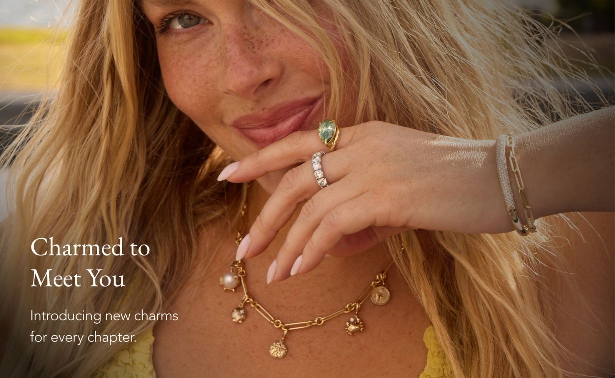 Camille Kostek wearing seaside charms on a paperclip necklace