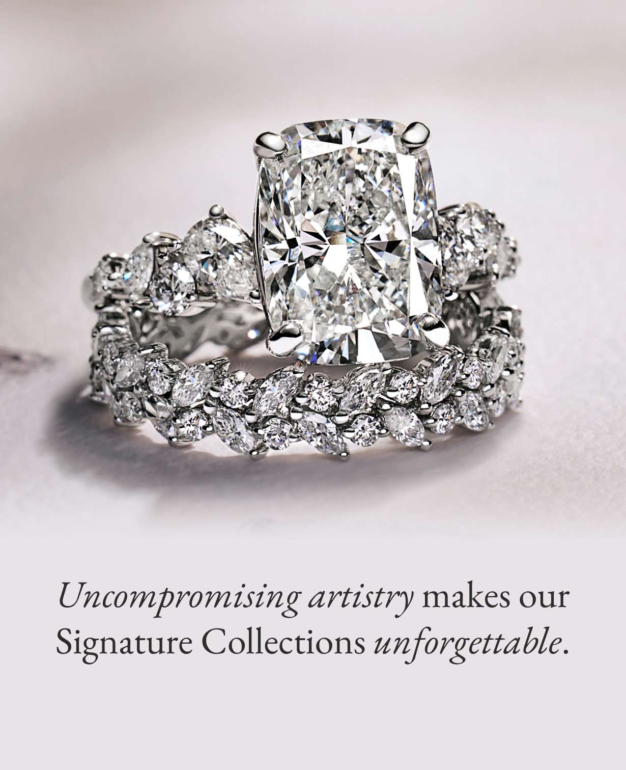 White gold diamond engagement on top of a diamond wedding band from our Signature Collection