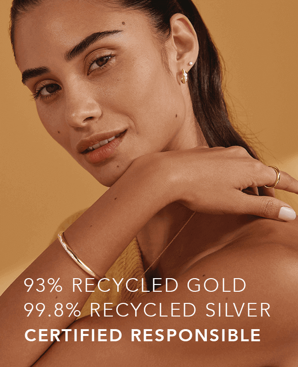 Model wearing recycled gold and silver jewelry