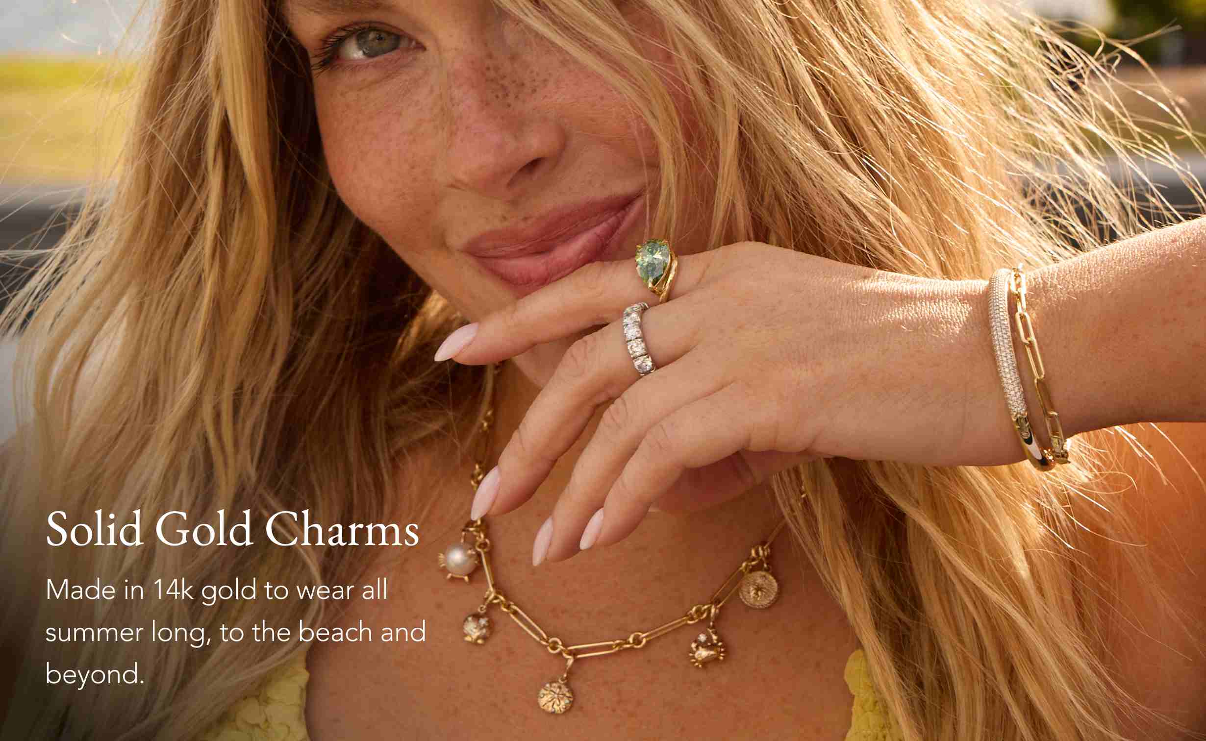 Camille Kostek wearing seaside charms on a paperclip necklace