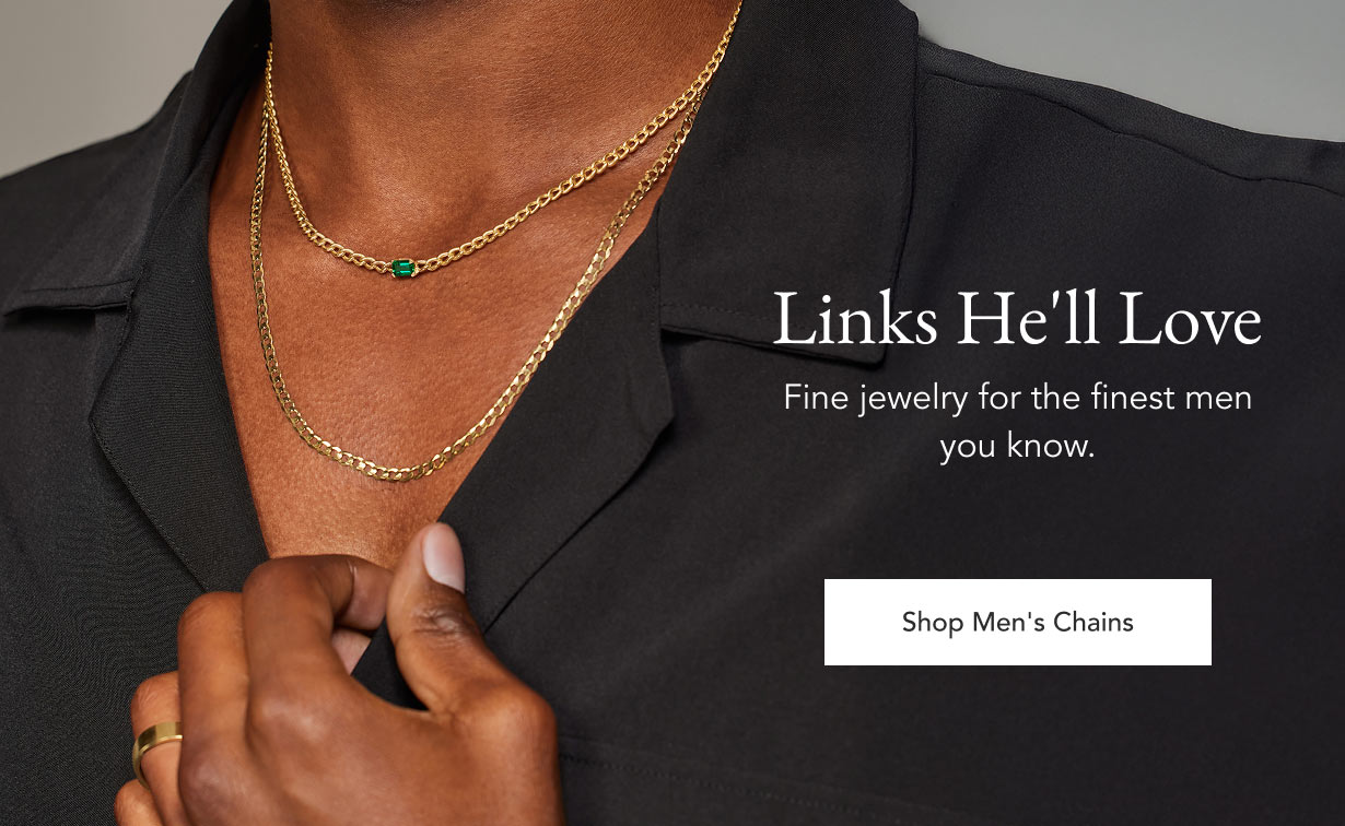 Model wearing men's chain necklaces.