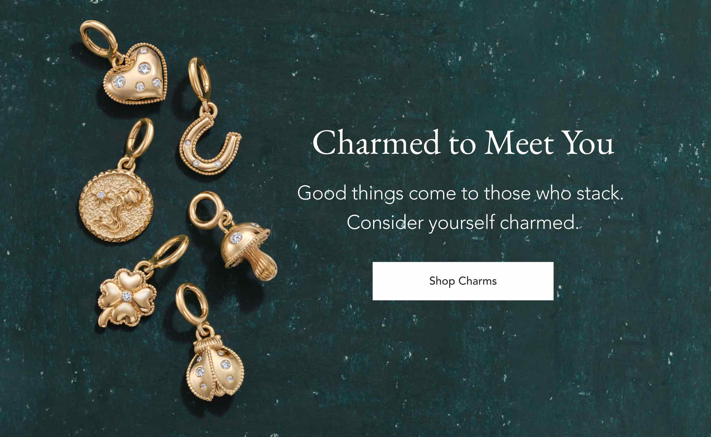 Assortment of gold Spring charms.