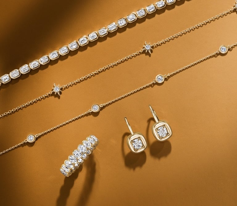 Assortment of diamond fine jewelry.