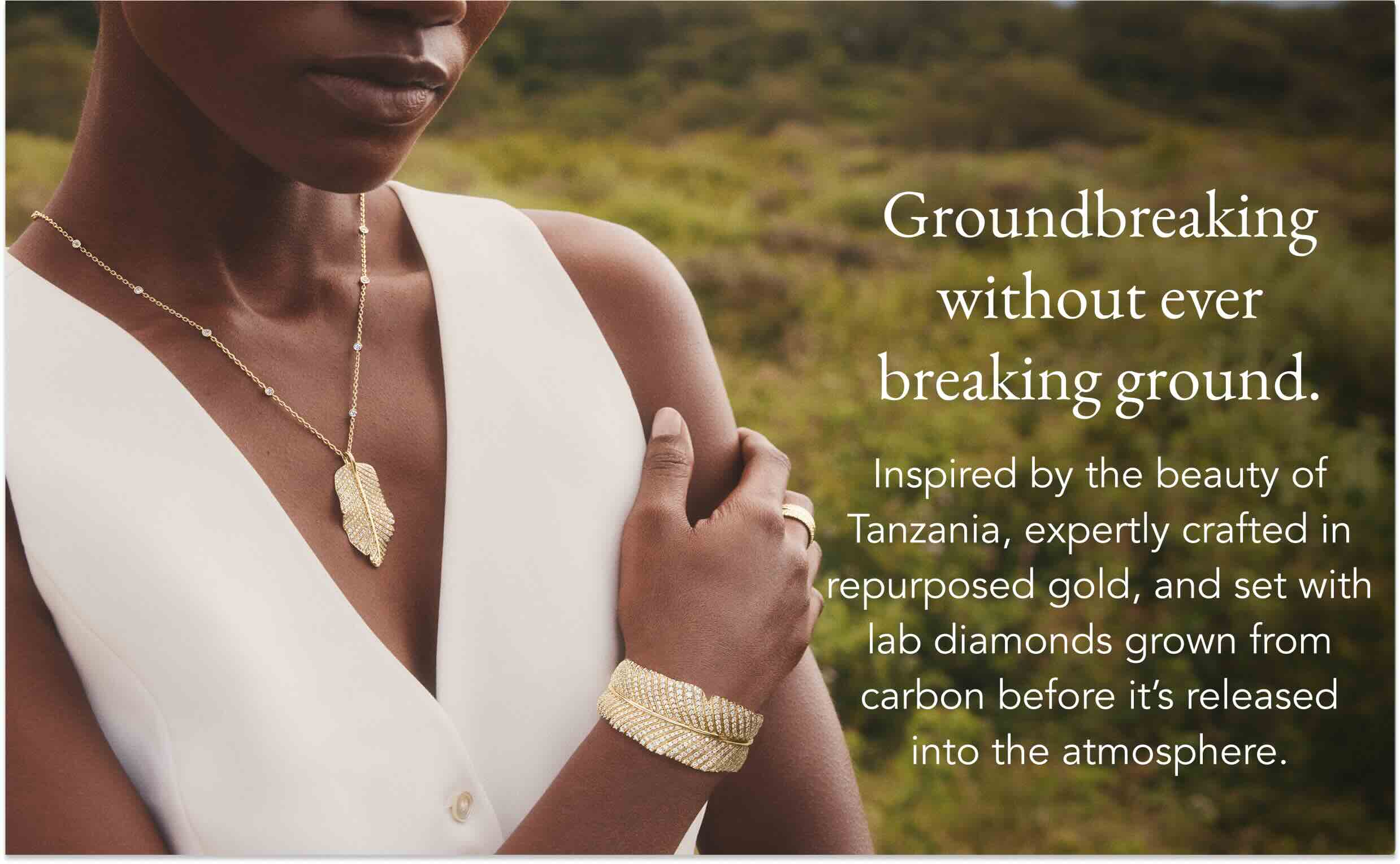 Model wearing necklace and cuff bracelet from The Jane Goodall Collection.