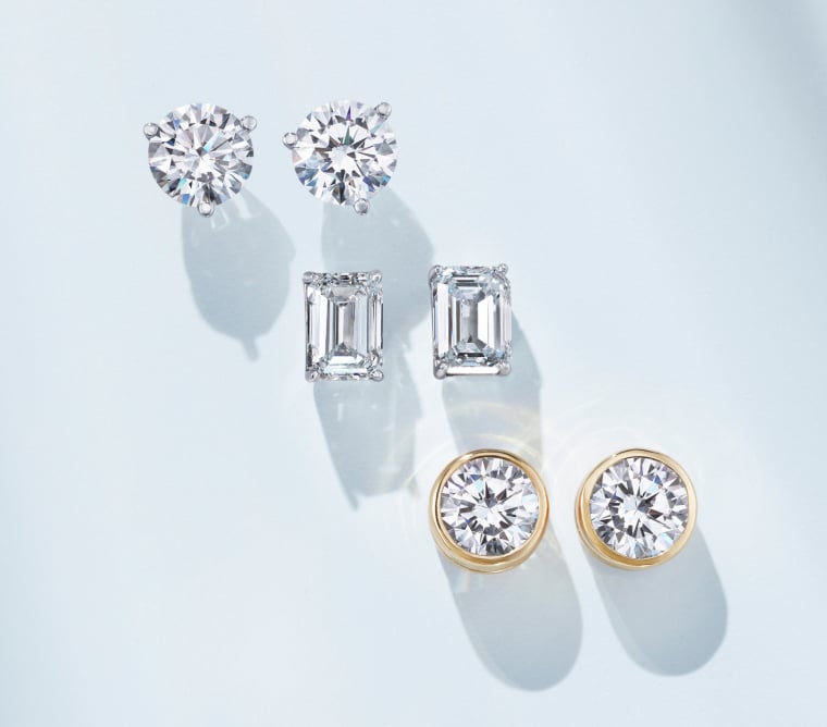 Assortment of diamond stud earrings.
