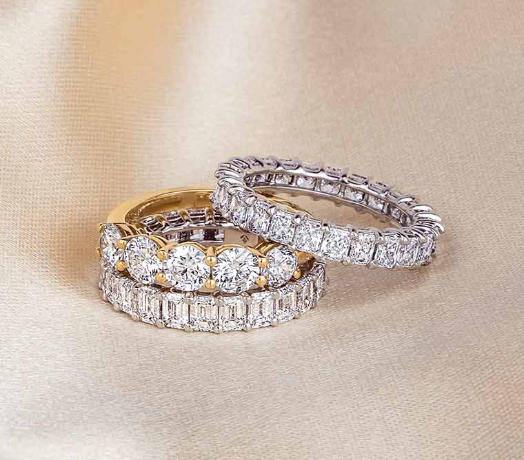 White and yellow gold, diamond wedding rings.