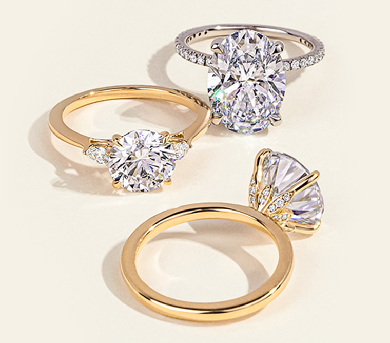 Gold, diamond engagement rings.