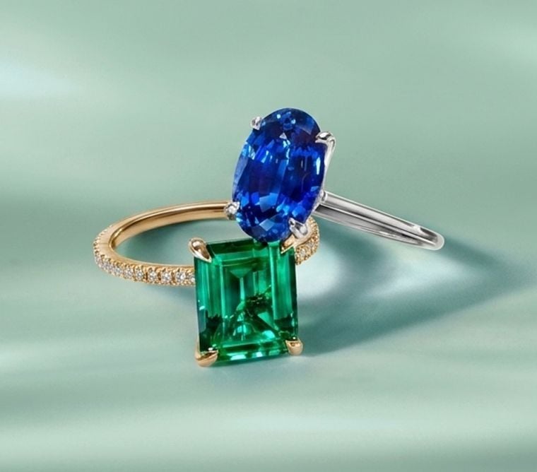 Two gemstone engagement rings