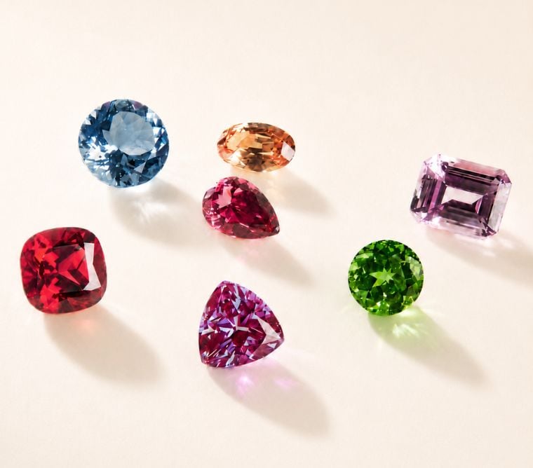 Assortment of lab colored diamonds.
