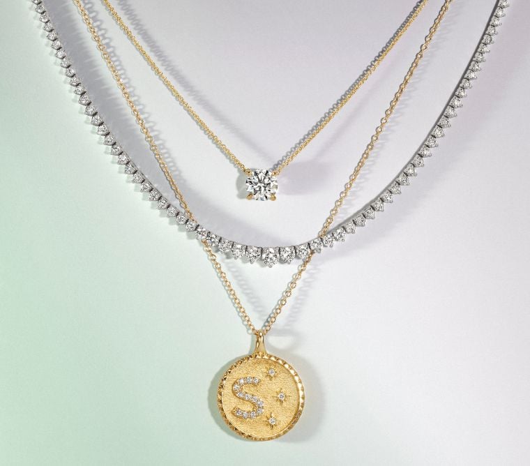 Assortment of layered necklaces.