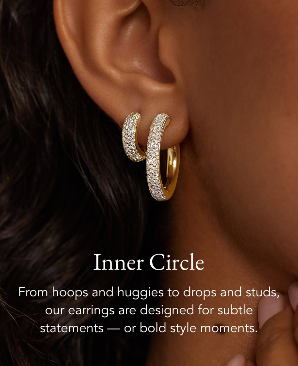 Gold and diamond hoop earrings.