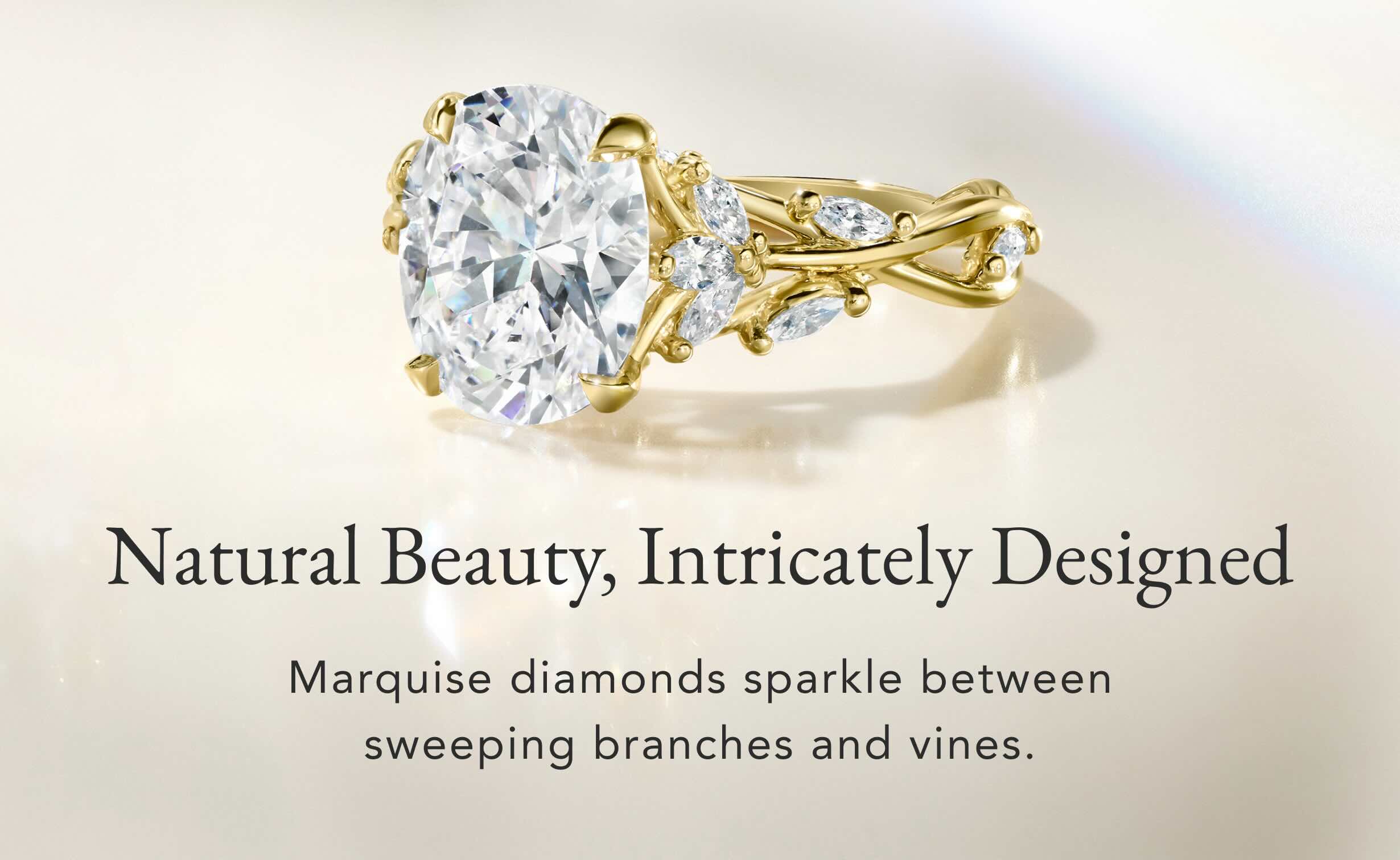 Gold diamond engagement ring from the Secret Garden collection.