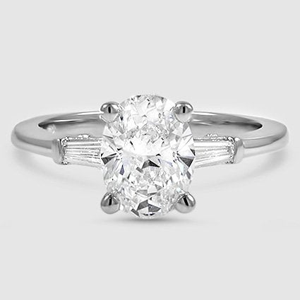 Platinum symphony tapered baguette three stone 