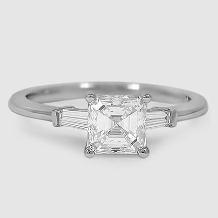 Platinum tapered baguette three stone 