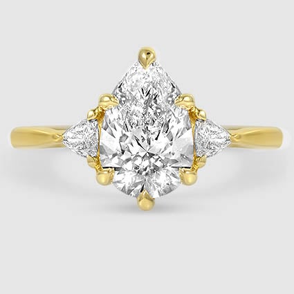 18K Yellow Gold trillion cut three stone 