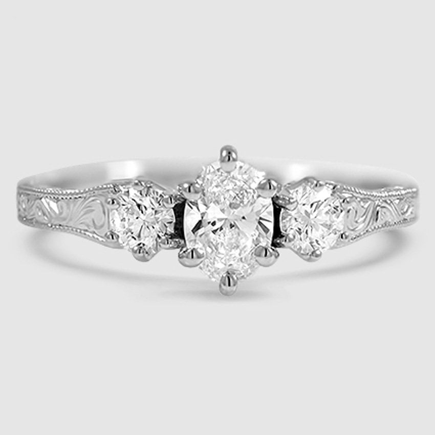 Platinum hudson engraved three stone 