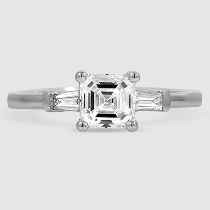 Platinum tapered baguette three stone 
