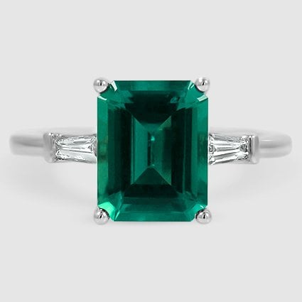 Platinum tapered baguette three stone 