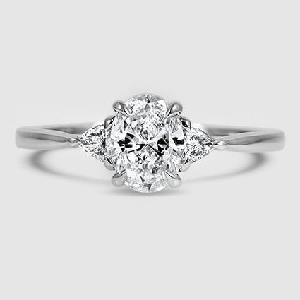 18K White Gold trillion cut three stone 