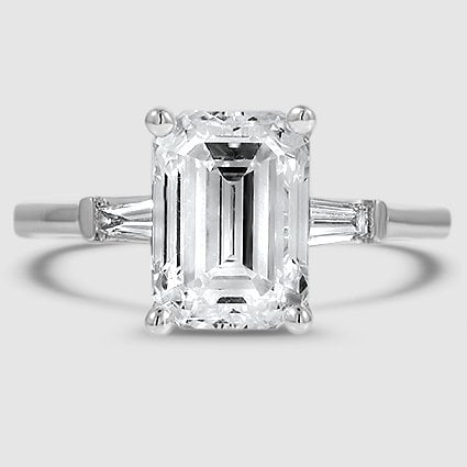 Platinum tapered baguette three stone 