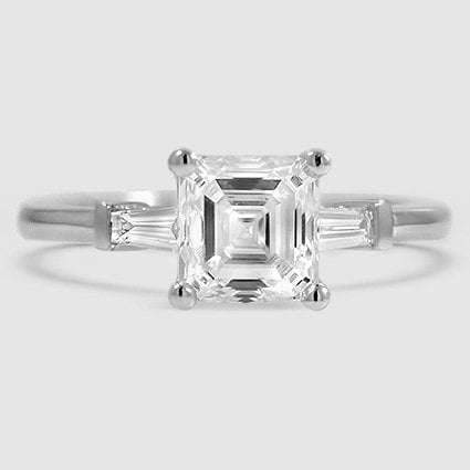 Platinum tapered baguette three stone 
