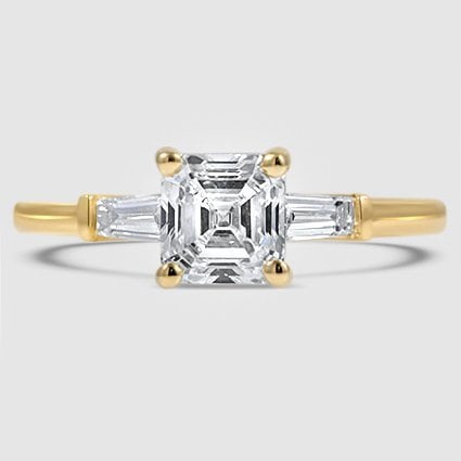 18K Yellow Gold symphony tapered baguette three stone 