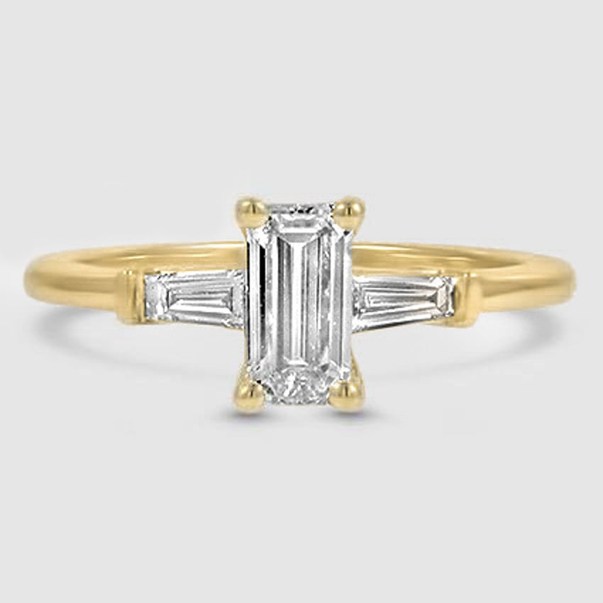 18K Yellow Gold tapered baguette three stone 