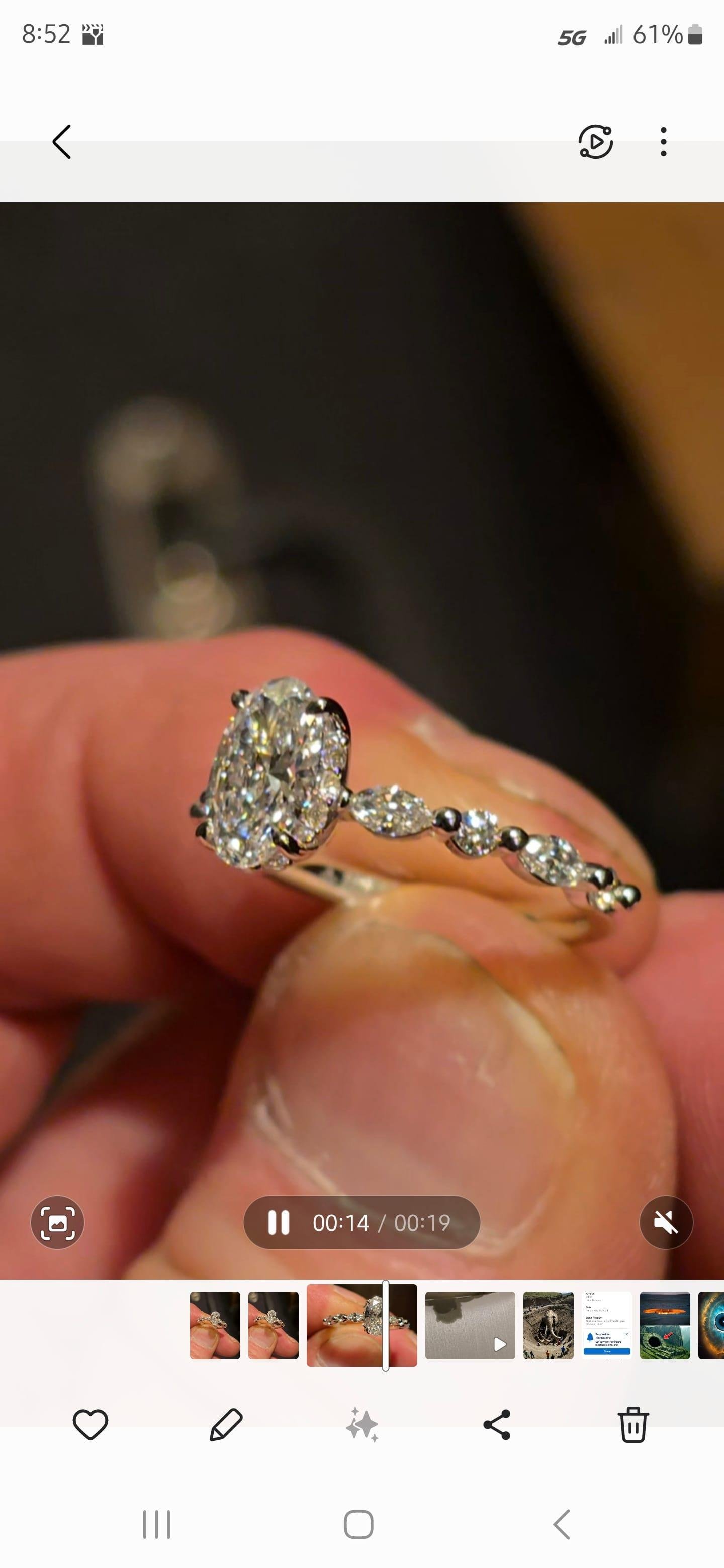 Oval diamond ring on hand