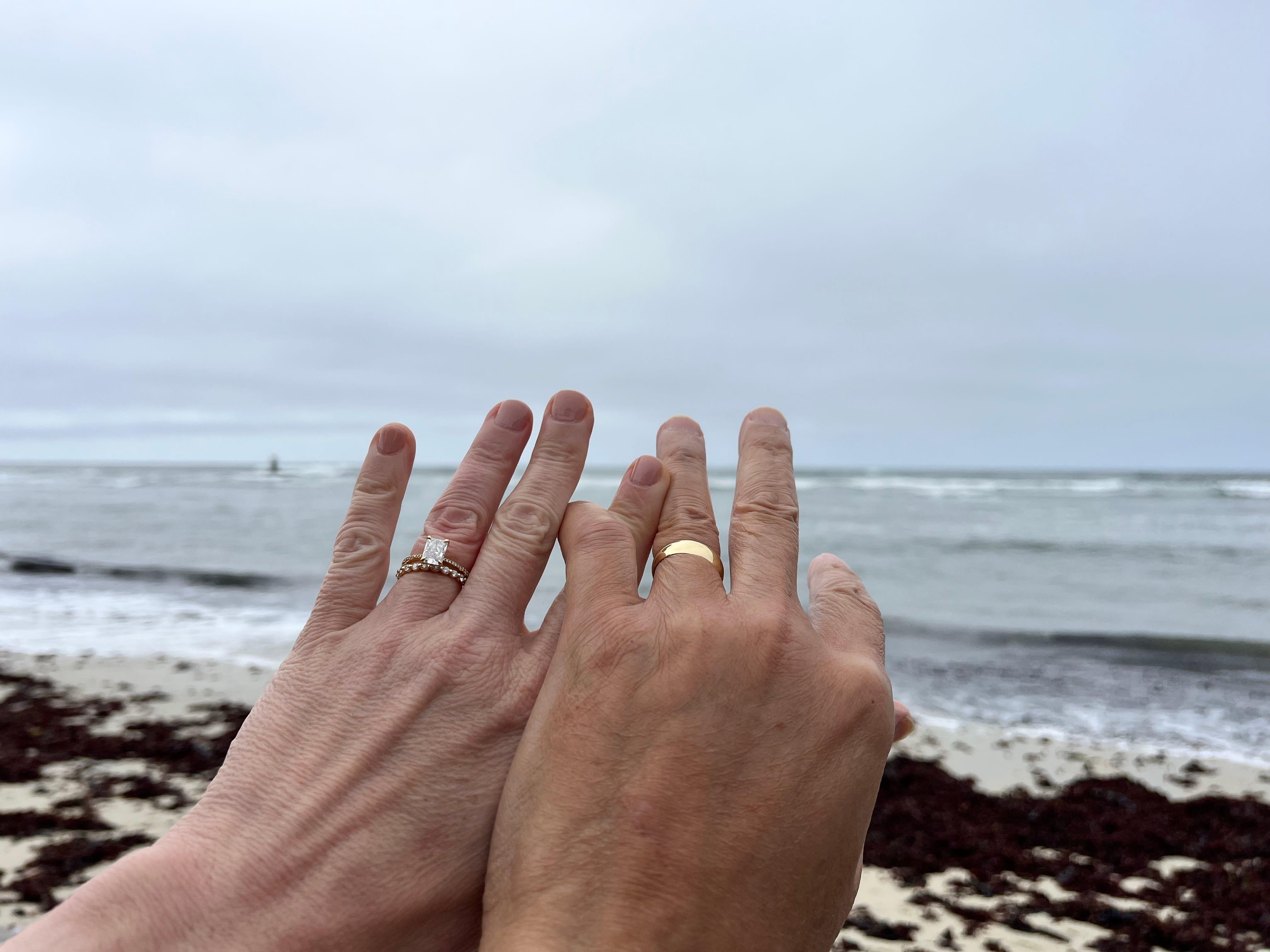 Oval diamond ring on hand
