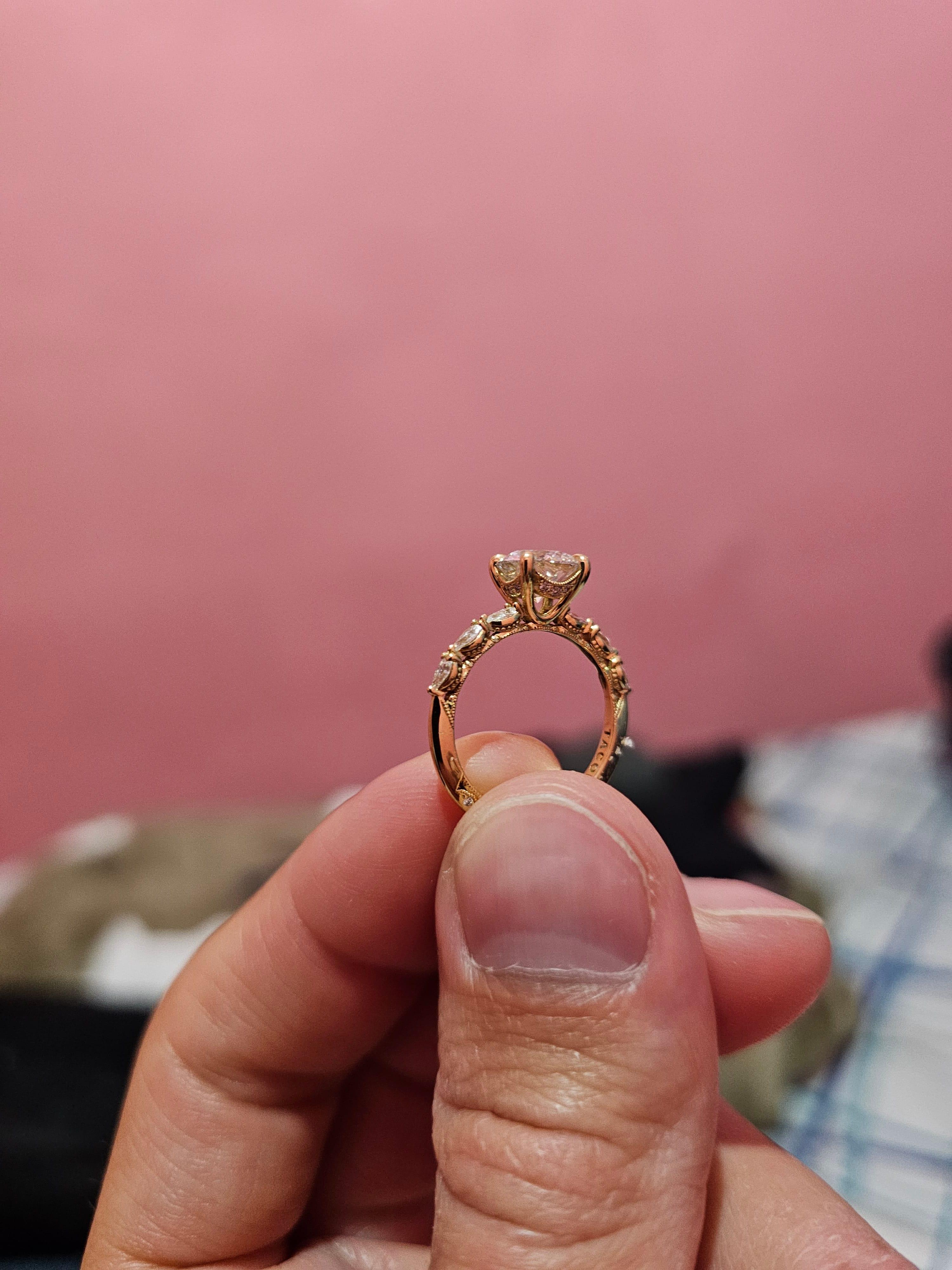 Oval diamond ring on hand
