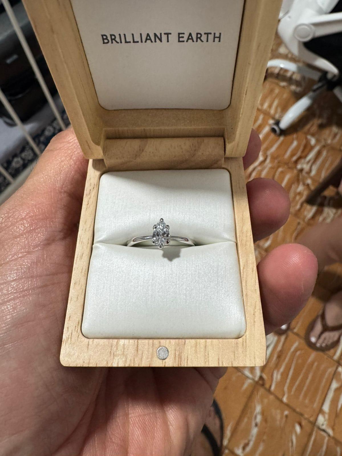 Oval diamond ring on hand