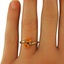 The Eugenia Ring, smalltop view on a hand